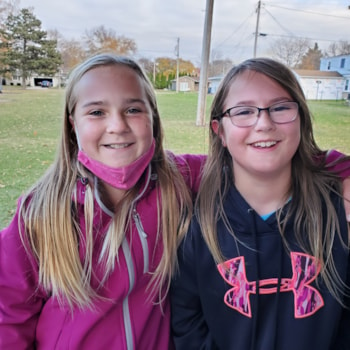 Two participants smiling at Girls on the Run Practice
